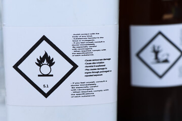 Oxidizing symbol on the chemical bottle , hazardous chemical