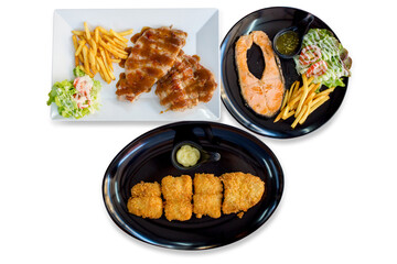 Top view of Salmond steak, pork steak with mix salad mayonnaise, focus selective