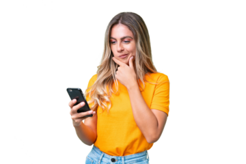 Young Uruguayan woman over isolated background thinking and sending a message