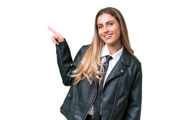 Business pretty Uruguayan woman wearing a biker jacket over isolated background pointing finger to the side