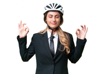 Business Uruguayan woman wearing a helmet biker over isolated background in zen pose