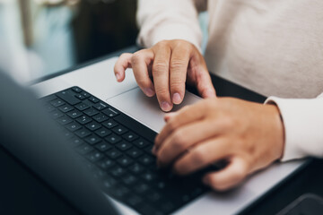 closeup of hands typing on a notebook, keyboard - Powered by Adobe