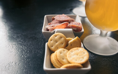 Aperitif snack with a glass of beer