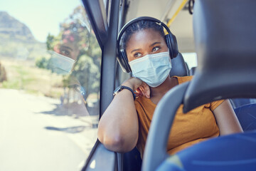 Black woman, covid and mask with headphones in transport for safe traveling, trip or destination...