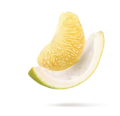 Pomelo pulp levitate isolated on white background.Clipping path.