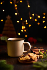 Mug of hot chocolate and Christmas decorations