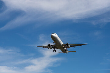 Fototapeta na wymiar a airplane on blue sky go to vacations