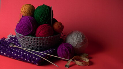 Piece of Colorful Knitted fabric, background or texture. Knitting yarn handmade.