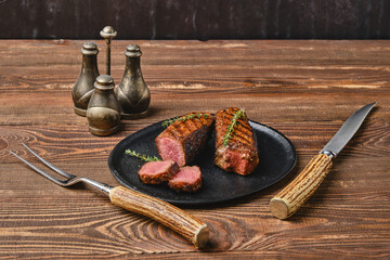 Roasted beef steak cut on slices