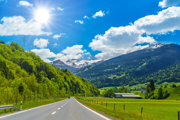 Fototapeta na wymiar Road among Alps mountains, Klosters-Serneus, Davos, Graubuenden