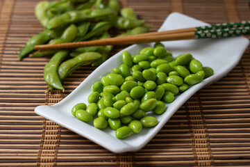 boiled edamame soy beans on plate