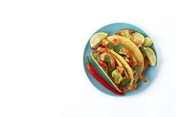 Mexican tacos with shrimp,guacamole and vegetables isolated on white background. Top view. Copy...