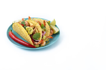 Mexican tacos with shrimp,guacamole and vegetables isolated on white background. Copy space