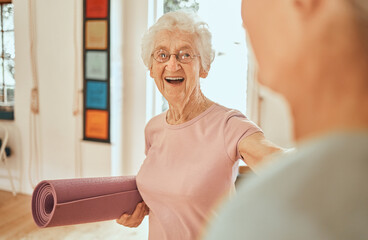 Yoga, fitness and workout with a senior woman holding an exercise mat in a class for wellness. Pilates, training and holistic with a mature female in a studio for mental health or lifestyle balance