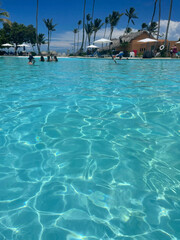  Wellbeing and relaxation in a peaceful and paradisiacal pool located in a luxurious caribbean resort