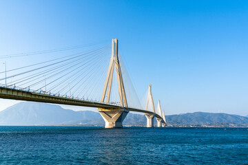 landscape view of the landmark Rio-Antirio Bridge across the Gulf of Corinth