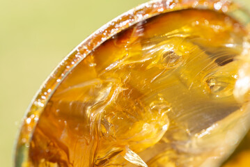Yellow machine waterproof grease in a can. Slippery viscosity for smearing details in automotive...