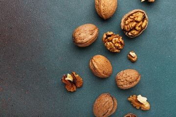 Fresh walnuts on color background