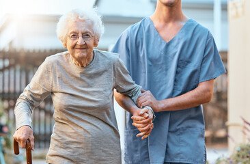 Elderly, woman and nursing home, caregiver and holding hands with healthcare for the old and...