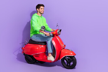 Full length size photo of youngster driver man new scooter looking empty space new courier delivery company isolated on violet color background