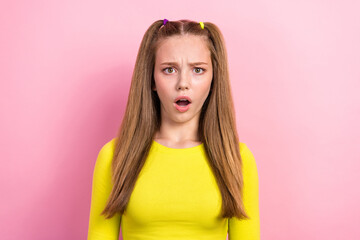 Portrait of upset dissatisfied offended girl with straight hairdo wear yellow long sleeve open...