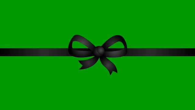 Animated black ribbon with a bow. Vector illustration isolated on the green background.