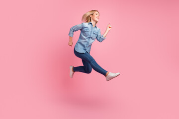 Fototapeta na wymiar Full size profile side photo of young happy girl run in air look copyspace isolated on pastel color background