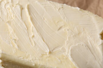 Piece of tasty homemade butter as background, closeup