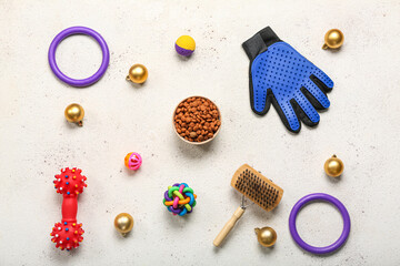 Pet accessories with Christmas balls on white background