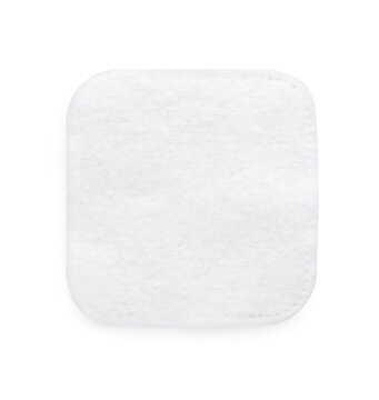 Soft clean cotton pad on white background, top view