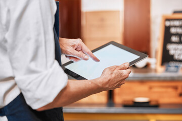 Store, manager and hands on tablet mockup for business app inventory, communication or online update. Tech, internet and professional shop management man with blank advertising screen.