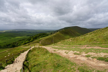 Dark clouds over the path up to the top of Mam Tor.