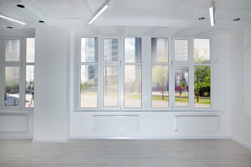 Fototapeta premium New empty room with clean windows and white wall