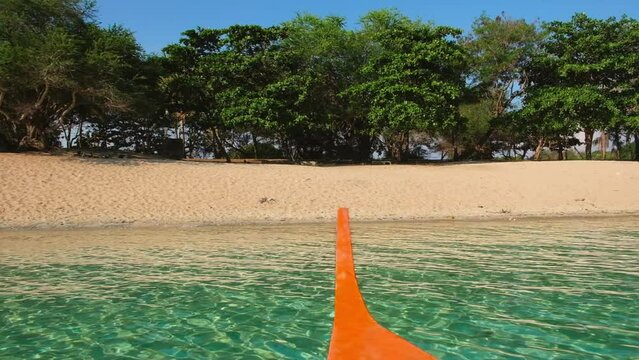 Orange Boat Coming Into Hermana Menor Island, Zambales, Philippines. FHD Resolution