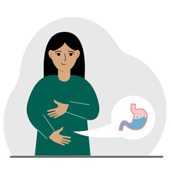 The concept of a healthy stomach. The woman holds her stomach with both hands. A healthy stomach or proper digestion.
