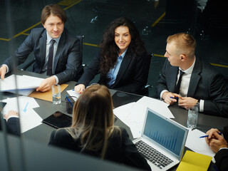 Business people having meeting in office top view