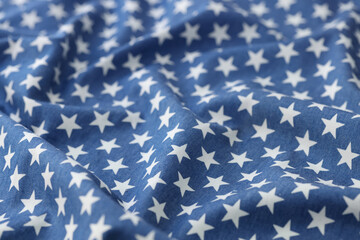 Blue wavy fabric with white stars texture background