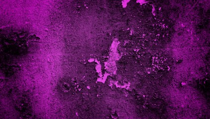 A textured purple concrete wall with a prominent vertical crack. 