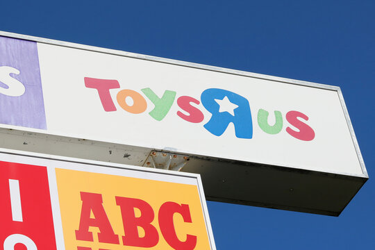 TOKYO, JAPAN - November 19, 2022: Sign outside Nikke Colton Plaza shopping mall in Ichkawa City featuring Toys 'R' Us and ABC Mart shoe store.