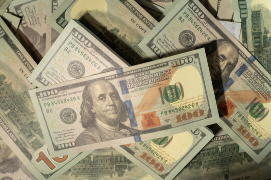 A pile of banknotes currency piles of dollar bills