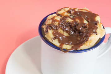 Mug cake with chocolate close up