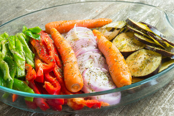 vegetable tray for baking Onion, pepper red and green, carrot and eggplant