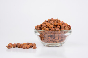 Black Chickpeas or Kala Chana with chana dal pulse isolated on wooden Background.