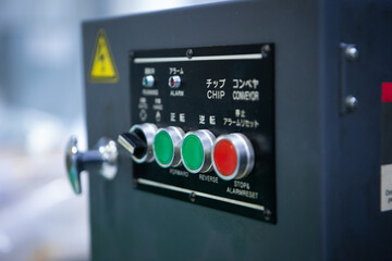 The control panel and analog switch with the control button of the machine in the manufacturing. Machining control keypad and display of machine automotive industrial