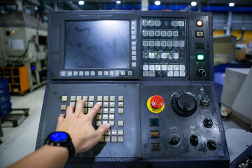 The control panel and analog switch with the control button of the machine in the manufacturing. Machining control keypad and display of machine automotive industrial
