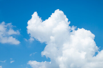 many beautiful white clouds in the sky.