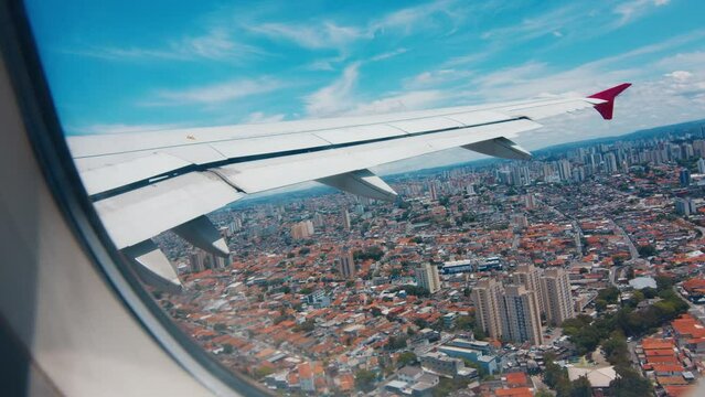 Airplane speeds up and takes off in the Brazilian airport. Timelapse of the airplane starting its flight over Brazil