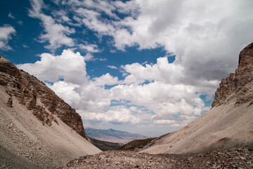 Clouds over Great Basin National Park on a summer day as seen from Wheeler Cirque looking northeast towards Mt. Moriah, which is seen in the distance. Located near Baker, Nevada..