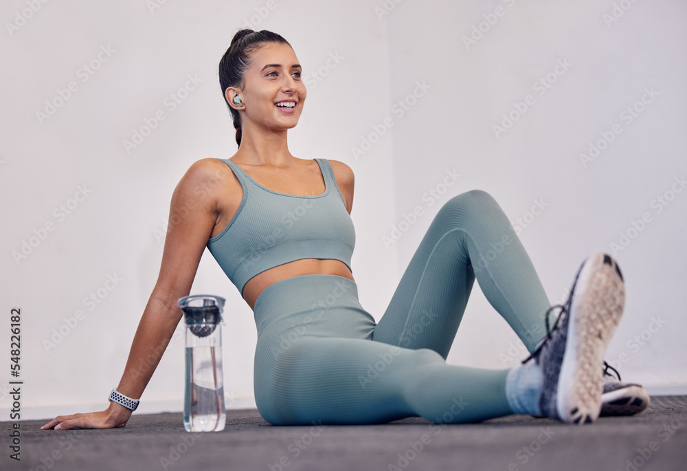 Sticker Relax, fitness and woman on the floor to rest with a water bottle in training, cardio workout or body exercise. Happy, wellness and healthy girl feeling tired or fatigue resting on a break at gym