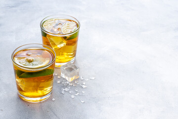 Alcoholic cocktails set with oganges and ice. Alcoholic drinks background